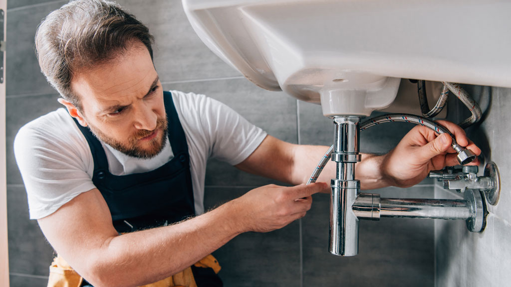 DIY faucet repair showing accessible plumbing work